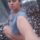 A pretty brunette girl glances back at the camera before taking a shit while squatting on the ground at an outdoor location after a sprinkling of snow. Presented in 720P HD. About 2 minutes.